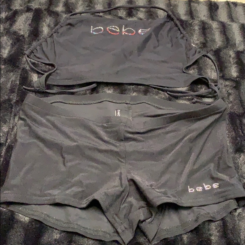 (SOLD) Bebe boy short swimsuit, size large women